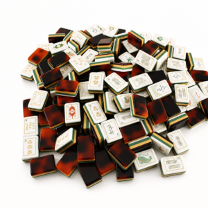 Amber Pavilion four-layer acrylic Mahjong tiles in a high-key studio setting