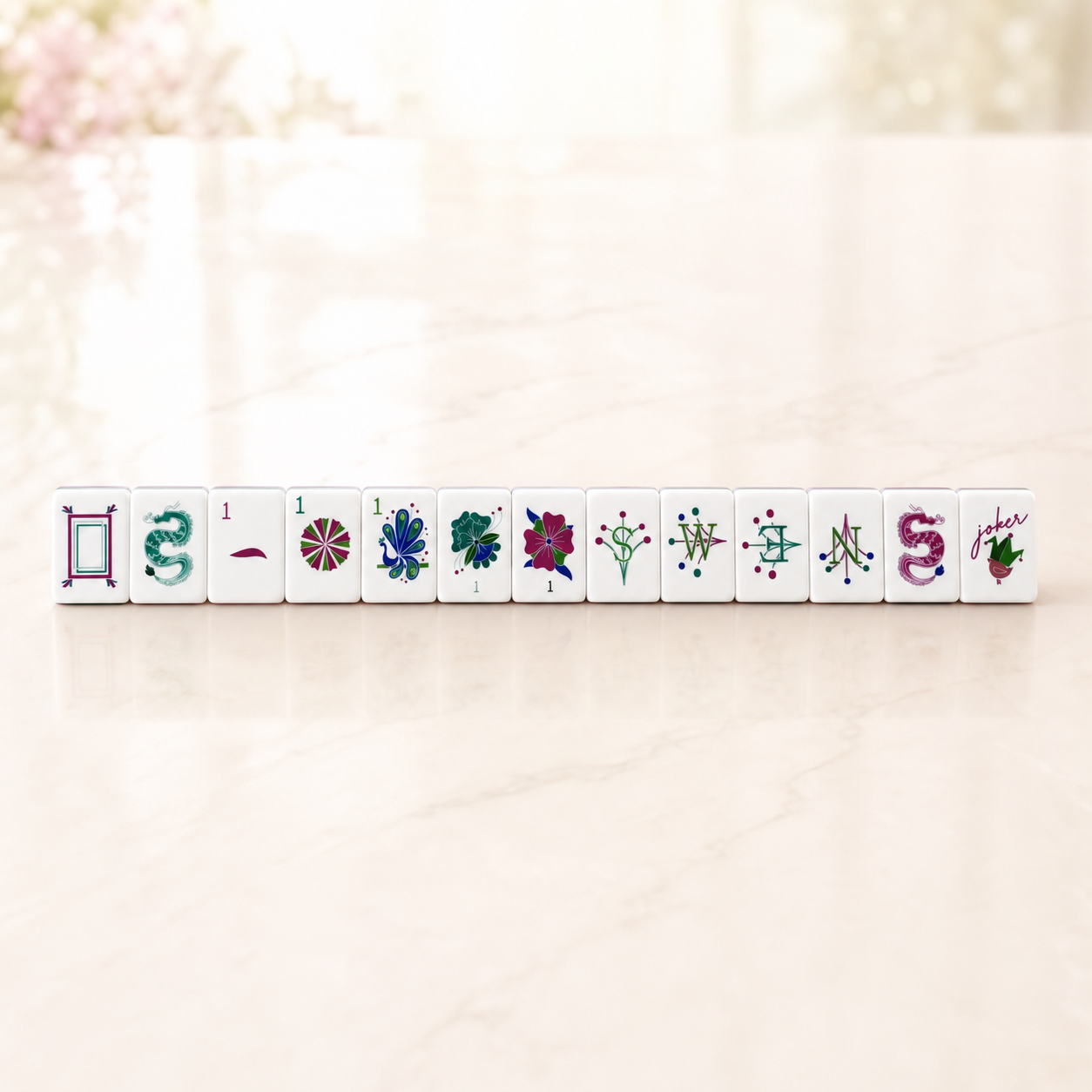Magenta Garden representative tile faces on a blush studio background