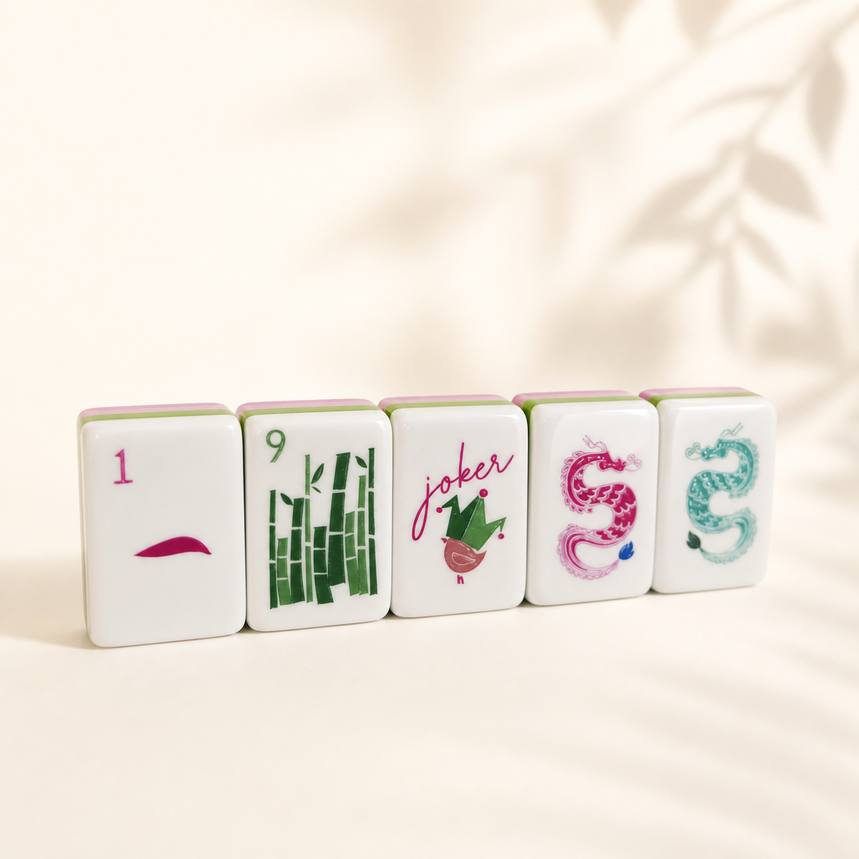 Angled Magenta Garden Mahjong tiles showing layered acrylic edges