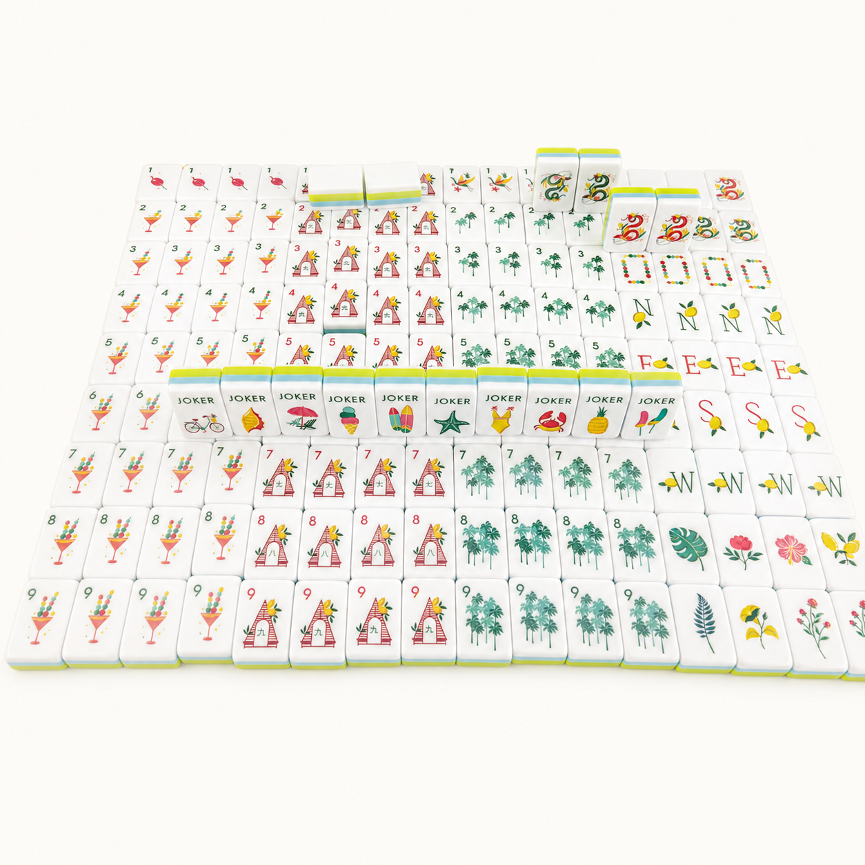 Hawaii Beach American Mahjong tile layout with suits honors flowers Jokers and blanks on a bright studio background