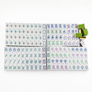 Emerald Elephant acrylic American Mahjong tile set in a high-key studio layout