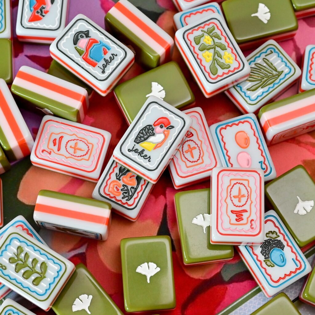 Birdsong and Ginkgo mahjong tiles with bird Jokers, botanical faces and white ginkgo motifs on olive backs