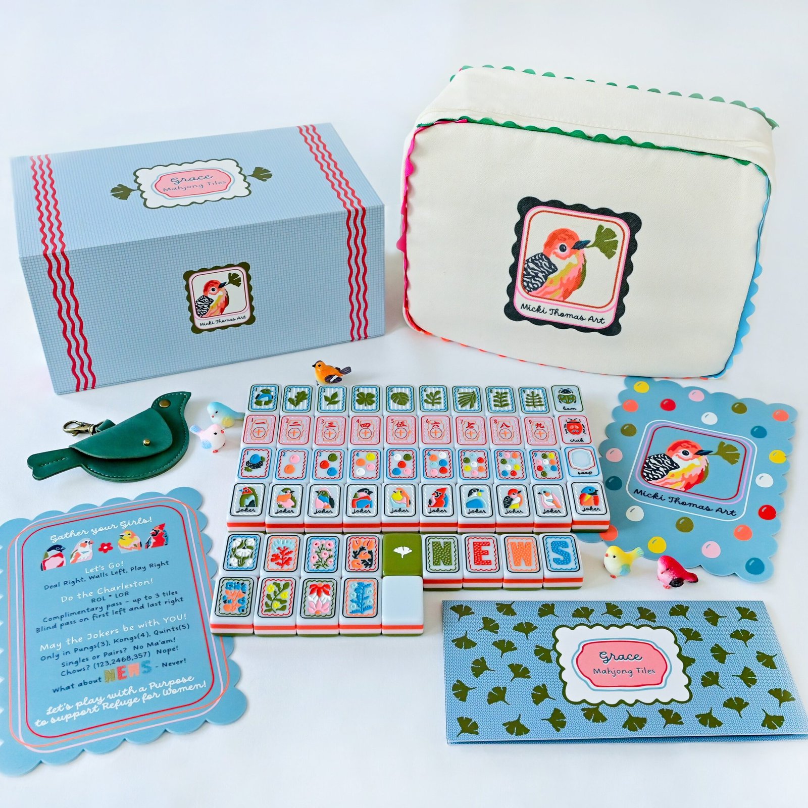 Birdsong and Ginkgo tiles photographed with packaging and accessories; pictured accessories are not confirmed inclusions