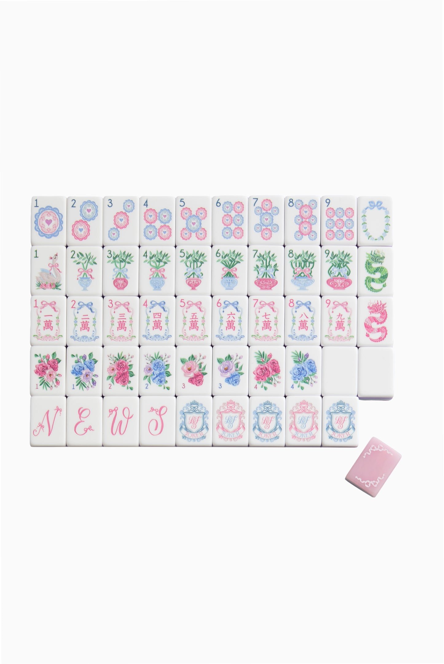 Blush Bow Garden mahjong tiles with pink bow backs, floral faces and pale blue and lilac edges