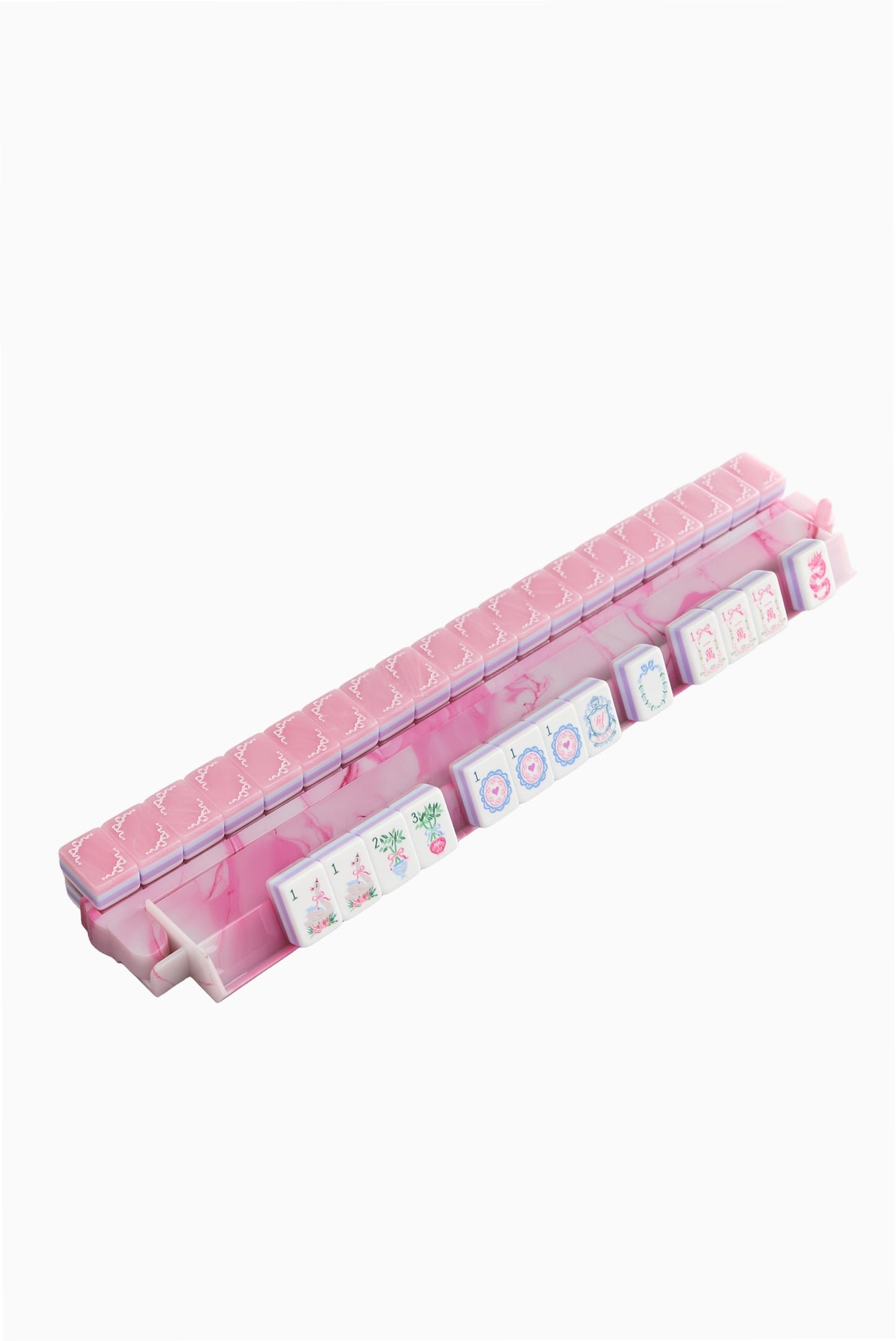 Blush Bow Garden mahjong tiles with pink bow backs, floral faces and pale blue and lilac edges
