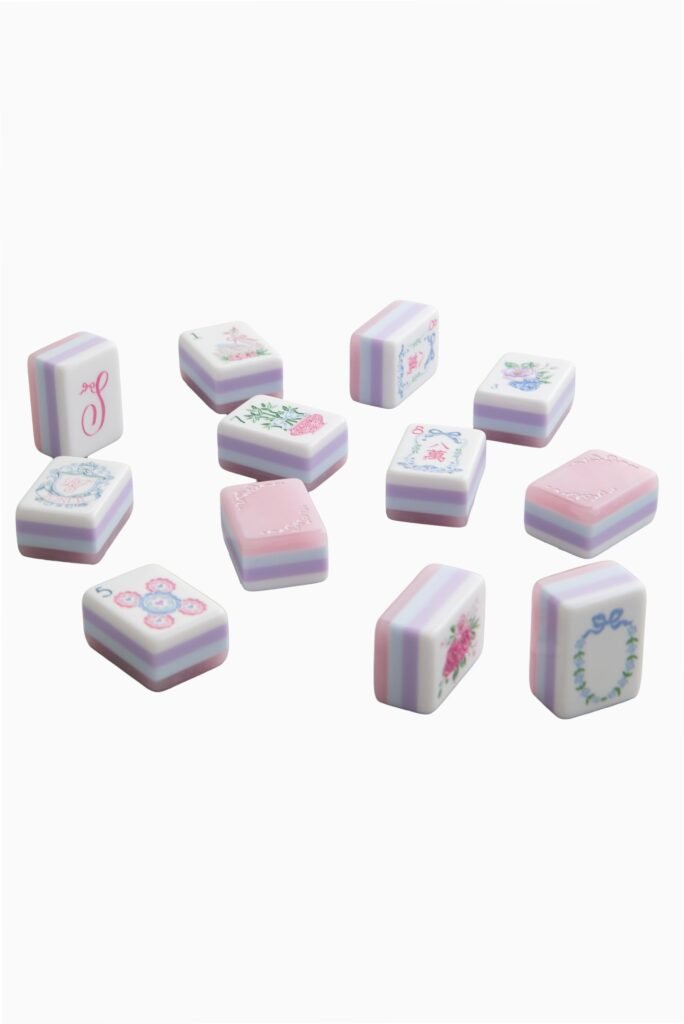 Blush Bow Garden mahjong tiles with pink bow backs, floral faces and pale blue and lilac edges