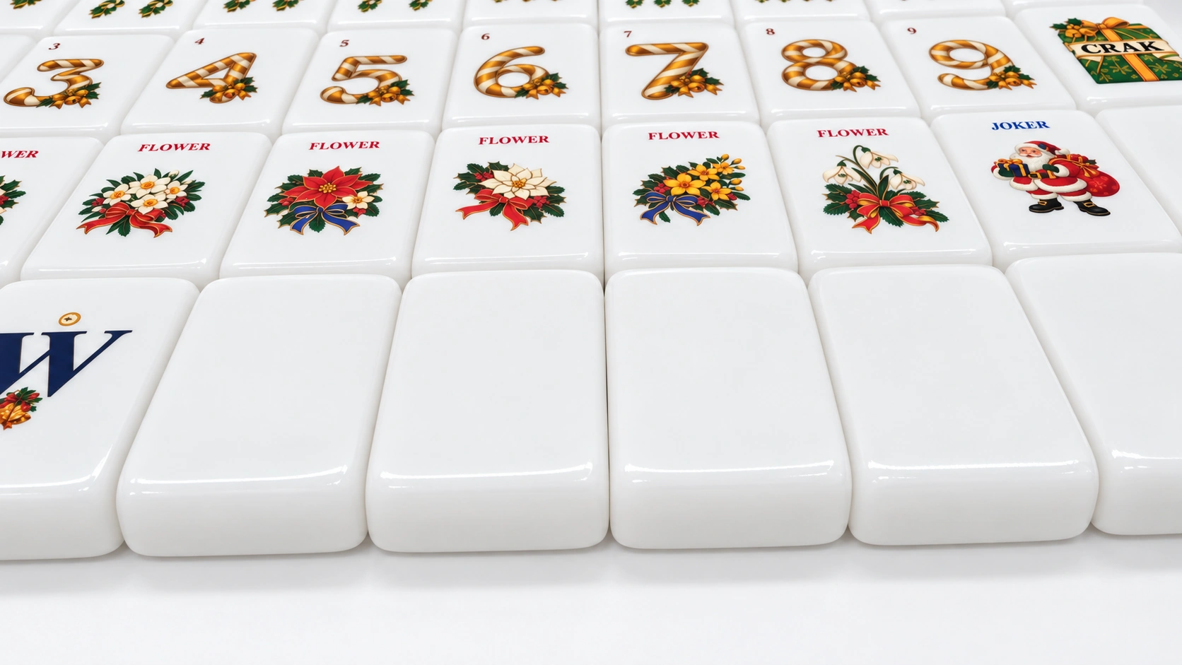 Classic Christmas Jubilee American Mahjong sample — plain white surfaces and low-angle tile profile. Studio presentation.