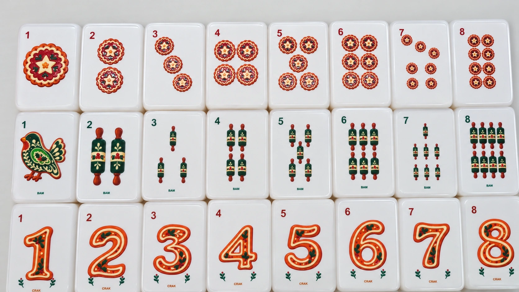 Gingerbread Icing House American Mahjong sample. Festive colour, across the suits.